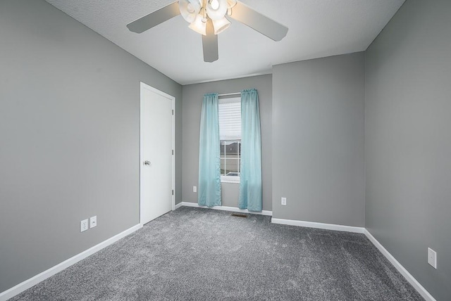953 N Hickory Dr, Tonganoxie, KS 66086 - carpeted empty room with ceiling fan and baseboards