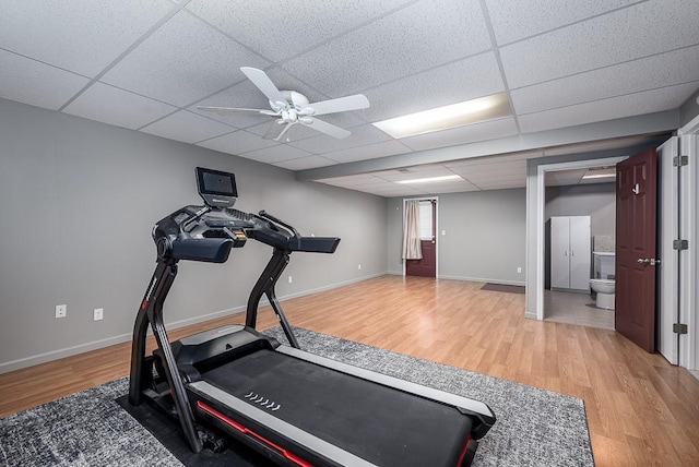 953 N Hickory Dr, Tonganoxie, KS 66086 - workout room featuring a drop ceiling, light wood finished floors, a ceiling fan, and baseboards