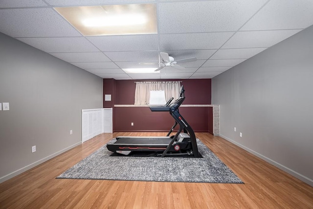 953 N Hickory Dr, Tonganoxie, KS 66086 - workout room featuring a ceiling fan, a paneled ceiling, baseboards, and wood finished floors