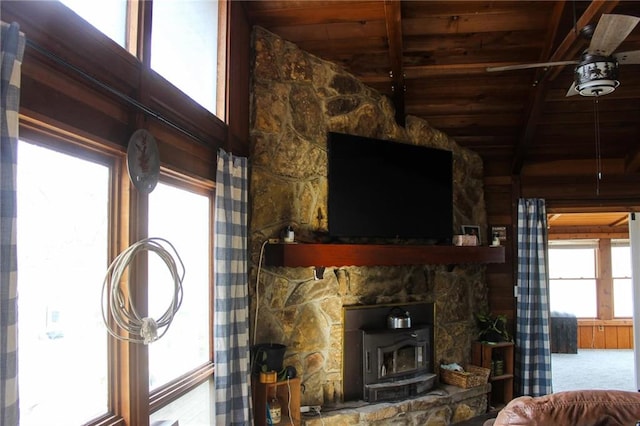 living room with beamed ceiling, wooden ceiling, and a ceiling fan