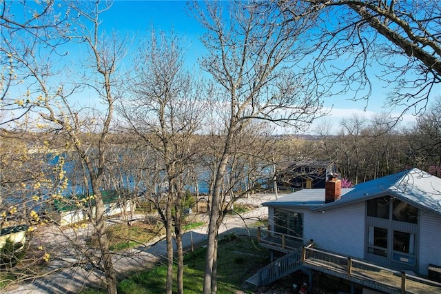 property view of water featuring stairs