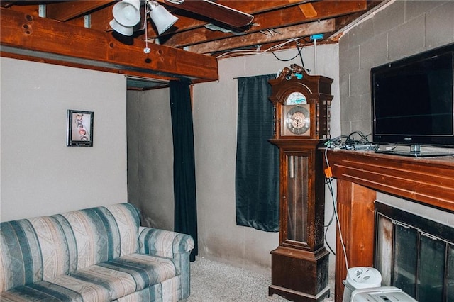 living room with carpet flooring and ceiling fan