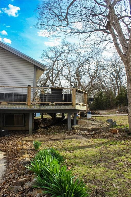 view of yard featuring a wooden deck