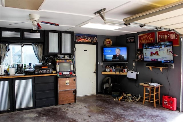 garage with a ceiling fan
