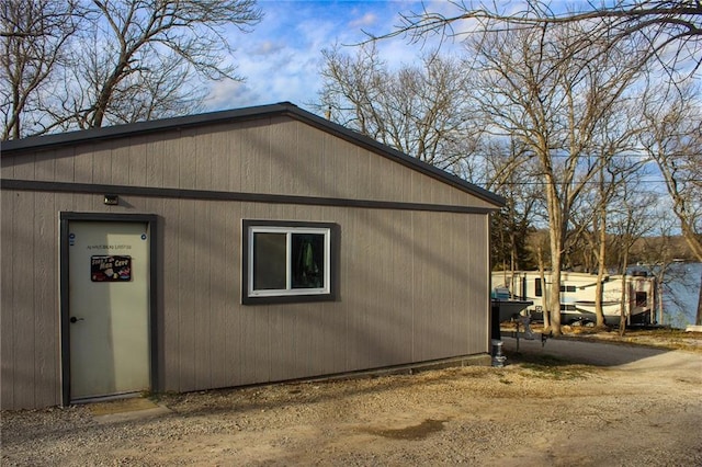 view of home's exterior featuring an outbuilding