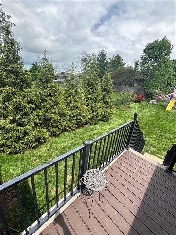 903 Chisam Rd, Kearney, MO 64060 - deck featuring fence, a playground, and a yard