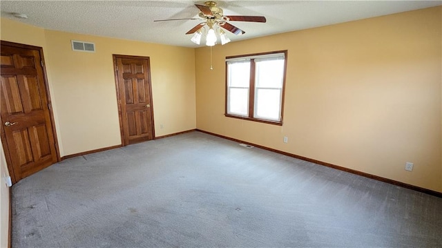 2023 Linden Rd, Hiawatha, KS 66434 - empty room with light colored carpet, ceiling fan, baseboards, and visible vents