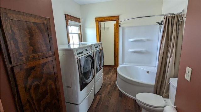 2023 Linden Rd, Hiawatha, KS 66434 - full bath with toilet, shower / tub combo with curtain, wood finished floors, and washer and clothes dryer