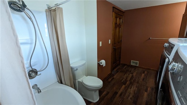 2023 Linden Rd, Hiawatha, KS 66434 - bathroom with toilet, wood finished floors, visible vents, and shower / bathtub combination with curtain