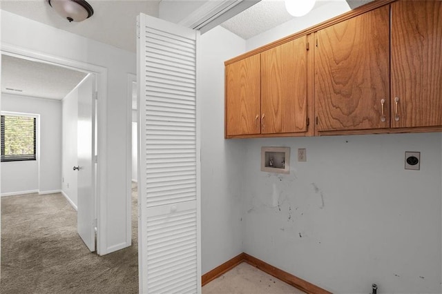 laundry room with electric dryer hookup, cabinet space, baseboards, washer hookup, and light colored carpet