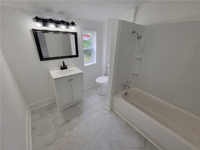 6211 Washington St, Saint Joseph, MO 64504 - full bath with baseboards, marble finish floor, toilet, vanity, and shower / bathing tub combination