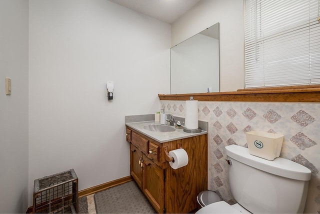 half bath with vanity and toilet