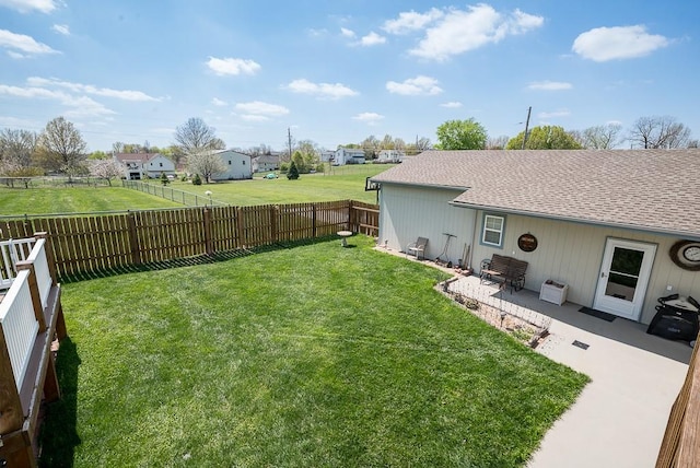 view of yard with a patio and a fenced backyard