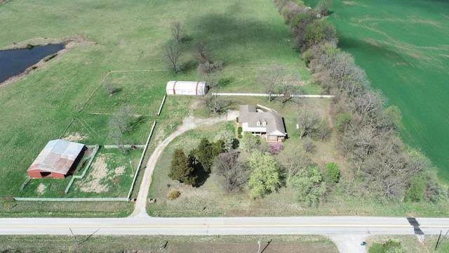 birds eye view of property featuring a rural view