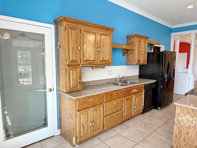 kitchen featuring crown molding, tasteful backsplash, black appliances, light tile patterned flooring, and a sink