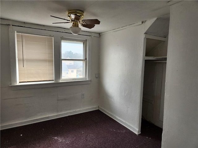 1126 S Pearl St, Independence, MO 64050 - unfurnished bedroom with baseboards and ceiling fan
