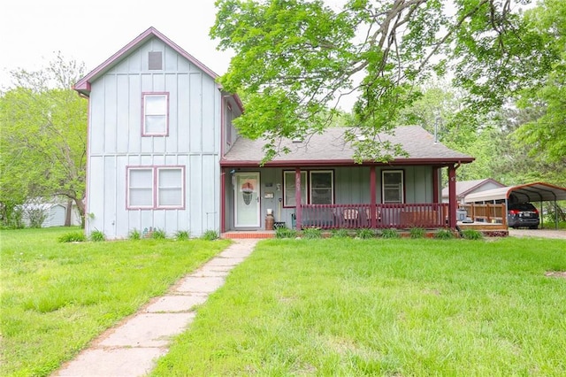 1404 S Market St, Holden, MO 64040 - view of front of home featuring board and batten siding, a detached carport, a front lawn, a porch, and roof with shingles