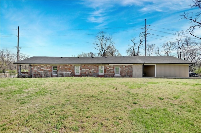 2705 Endicott Ave, Kansas City, KS 66104 - ranch-style house with fence and a front yard