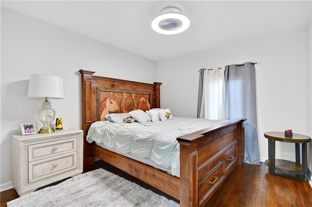 2705 Endicott Ave, Kansas City, KS 66104 - bedroom featuring dark wood-type flooring and baseboards