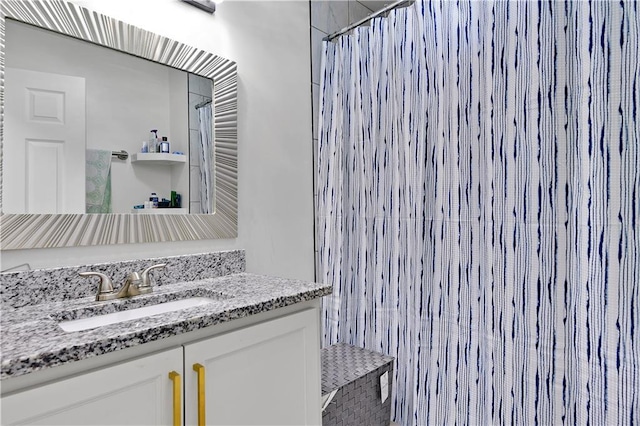 2705 Endicott Ave, Kansas City, KS 66104 - bathroom featuring vanity and a shower with shower curtain