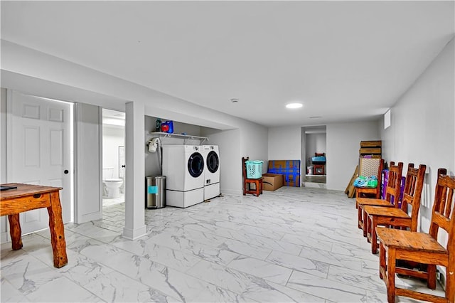 2705 Endicott Ave, Kansas City, KS 66104 - interior space with baseboards, marble finish floor, separate washer and dryer, and recessed lighting