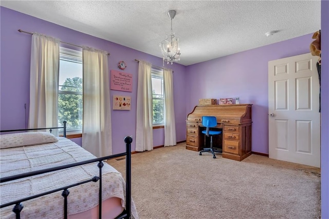 carpeted bedroom featuring a notable chandelier, baseboards, multiple windows, and a textured ceiling