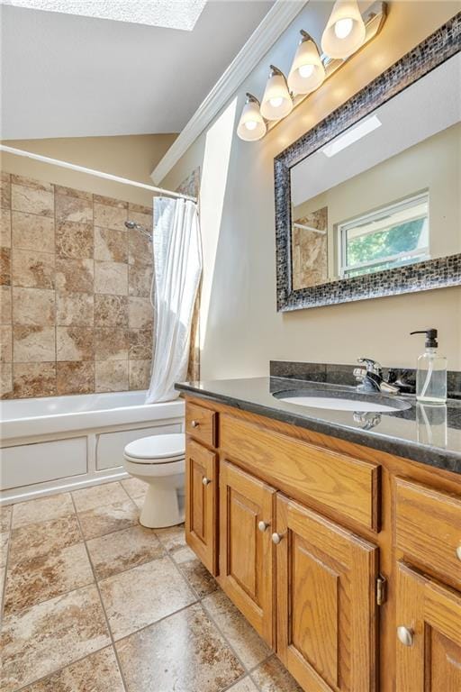 full bathroom featuring toilet, vanity, and shower / tub combo