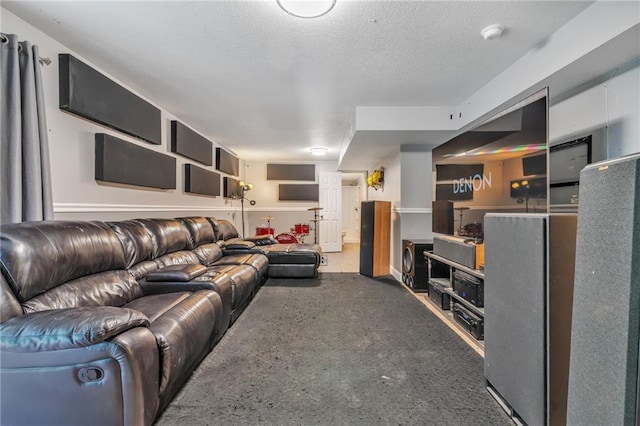 carpeted living room featuring a textured ceiling