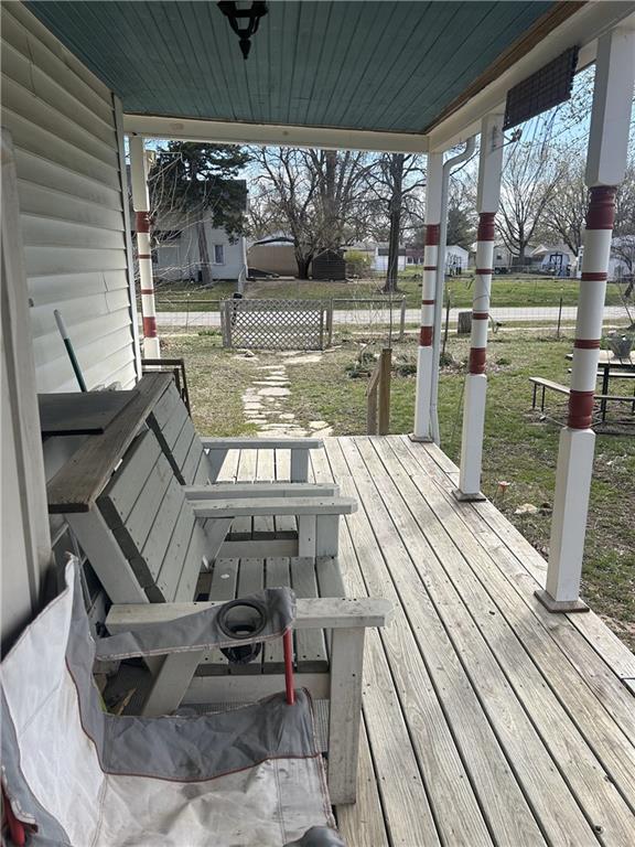 deck featuring a lawn