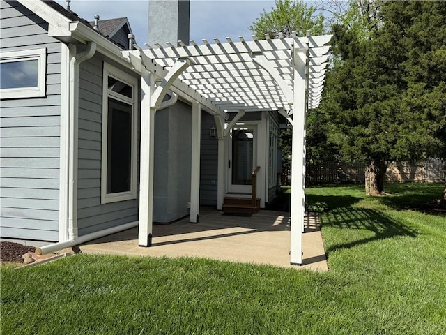 view of patio featuring fence and a pergola