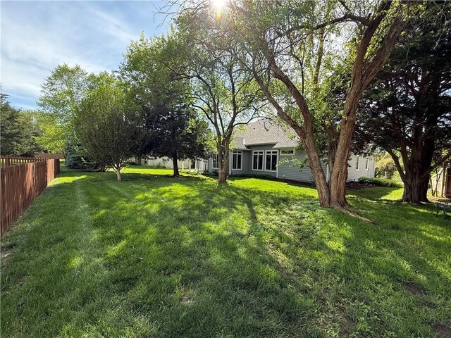 view of yard featuring fence