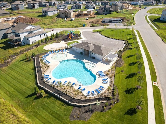 3208 SW Saddlebred Ter, Lees Summit, MO 64082 - aerial perspective of suburban area with a pool area