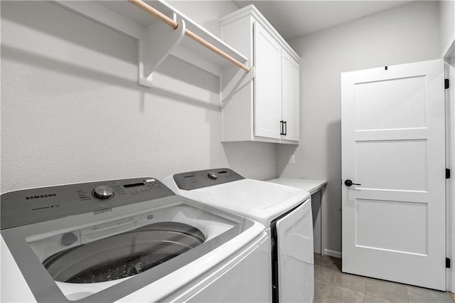 3208 SW Saddlebred Ter, Lees Summit, MO 64082 - clothes washing area with cabinet space and washer and dryer