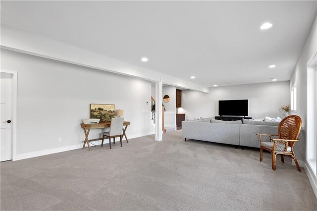 3208 SW Saddlebred Ter, Lees Summit, MO 64082 - living area with light colored carpet, recessed lighting, and baseboards