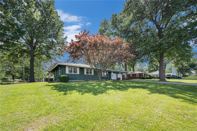 ranch-style house with a front yard