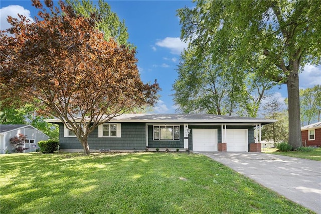 ranch-style home with a garage, a front yard, and driveway