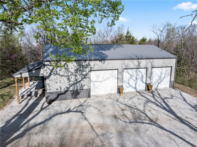 exterior space with gravel driveway