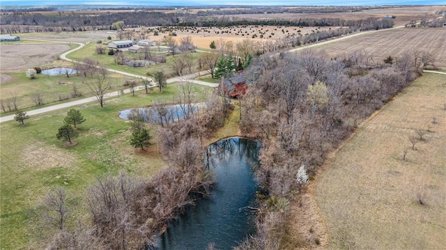 bird's eye view with a water view and a rural view