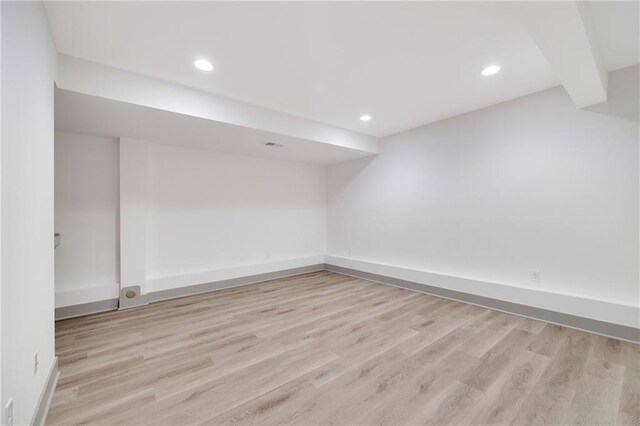 815 W Solomon Dr, Lone Jack, MO 64086 - spare room featuring light wood-style floors, baseboards, and recessed lighting