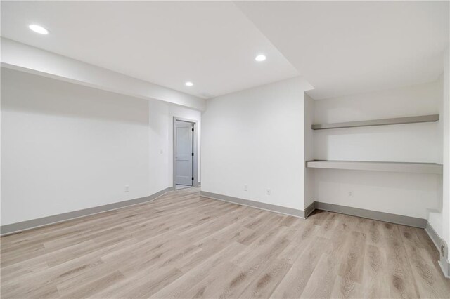 815 W Solomon Dr, Lone Jack, MO 64086 - unfurnished room featuring wood finished floors, recessed lighting, and baseboards