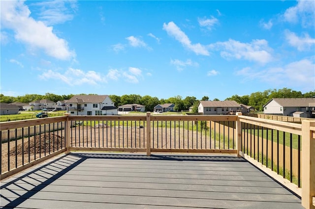 815 W Solomon Dr, Lone Jack, MO 64086 - wooden terrace featuring a residential view