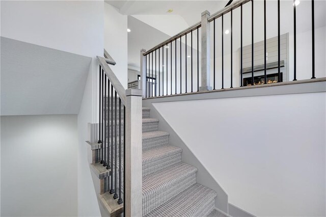 815 W Solomon Dr, Lone Jack, MO 64086 - staircase featuring a high ceiling