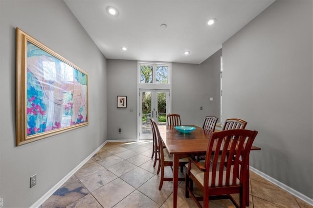 dining room featuring recessed lighting, light tile patterned floors, baseboards, and french doors