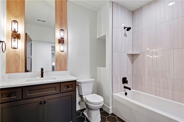 full bath with vanity, tile patterned flooring, visible vents, toilet, and washtub / shower combination