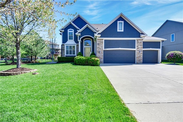 craftsman-style house featuring stone siding, a front yard, stucco siding, concrete driveway, and an attached garage
