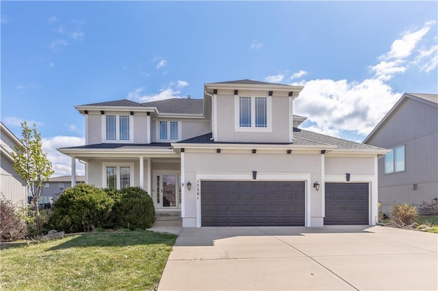 17281 S Kimble St, Olathe, KS 66062 - view of front of house featuring stucco siding, driveway, a front lawn, an attached garage, and a shingled roof