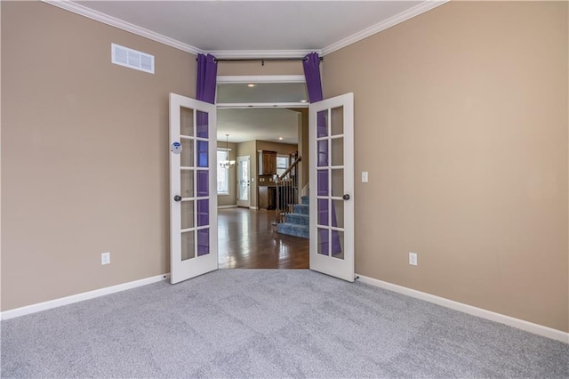 17281 S Kimble St, Olathe, KS 66062 - spare room with french doors, ornamental molding, carpet flooring, and stairway