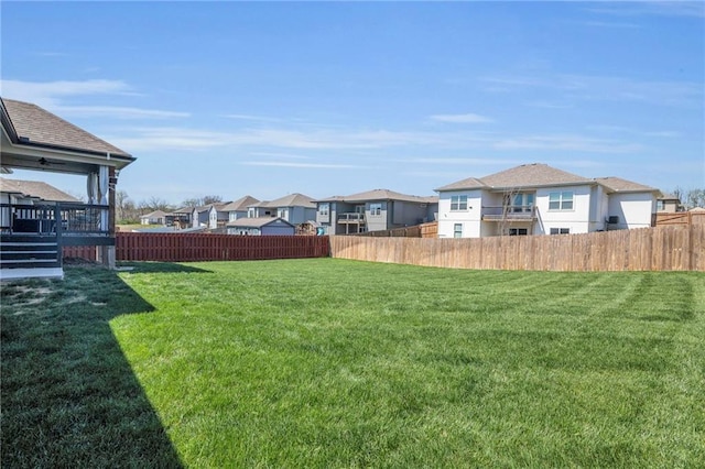900 NW Lindenwood Dr, Grain Valley, MO 64029 - view of yard with a residential view and a deck