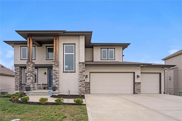 7295 NW Forest Lakes Dr, Parkville, MO 64152 - prairie-style home with concrete driveway, stucco siding, stone siding, and a front lawn