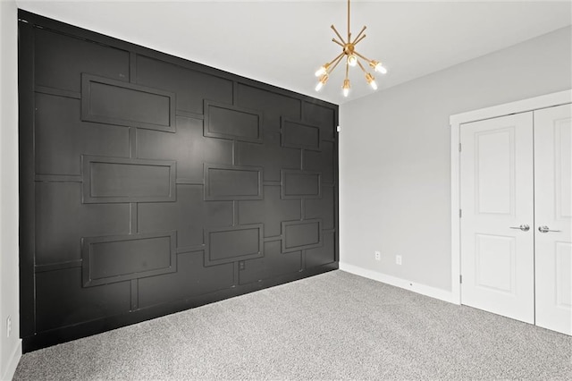 7295 NW Forest Lakes Dr, Parkville, MO 64152 - unfurnished bedroom featuring a chandelier, carpet floors, and a closet